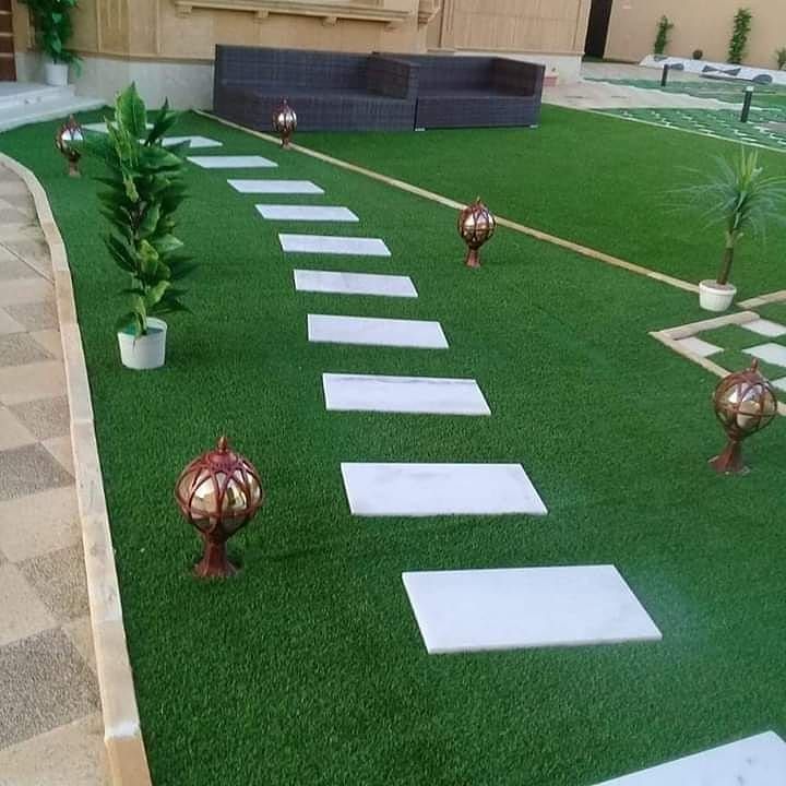 تركيب عشب صناعي بمكة للحدائق والأحواش والأسطح بتجهيز احترافي وتثبيت متين